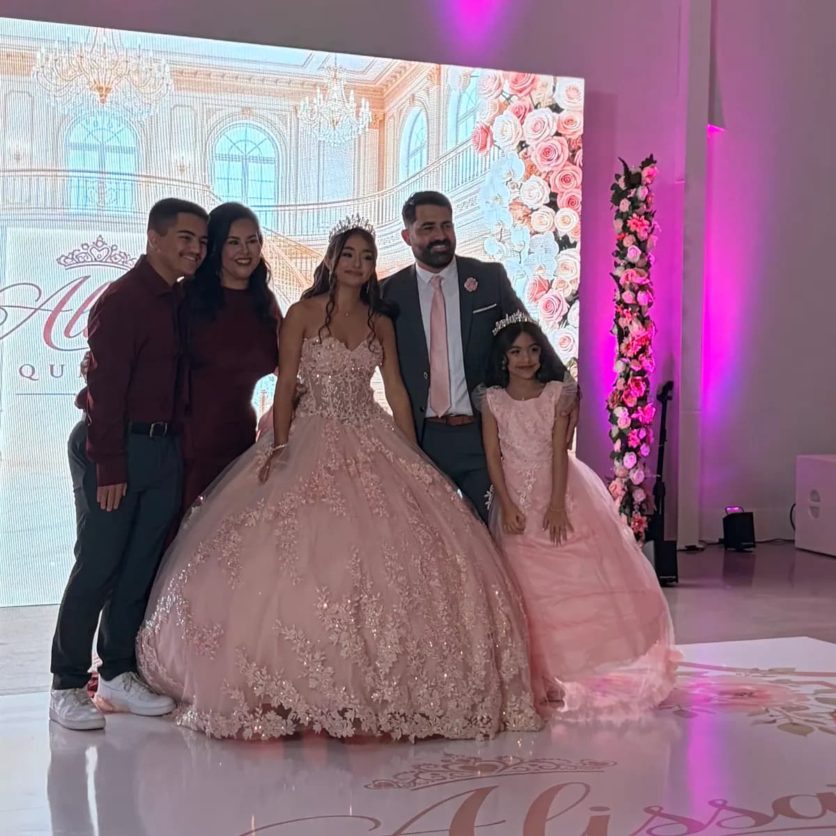 The Morales family with Alissa in her quinceañera gown